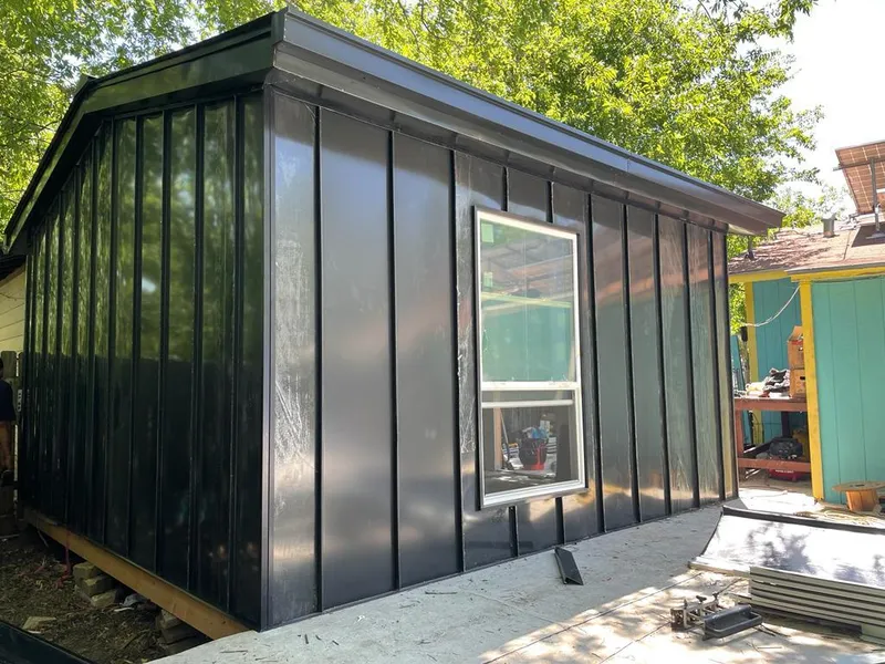 Black standing seam metal wall panels for Metal Roof Installation in Sapulpa